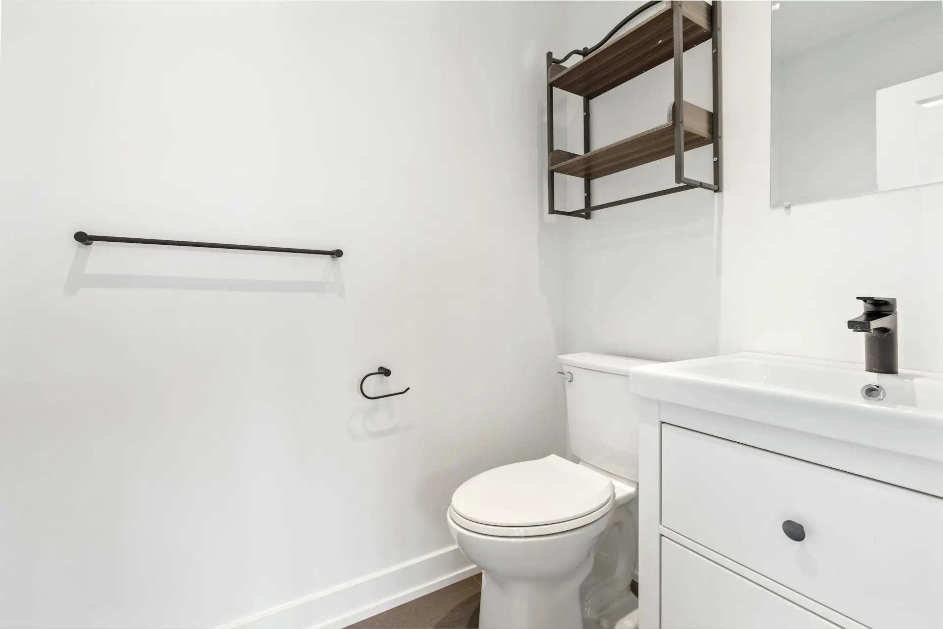 a bathroom with a toilet and sink