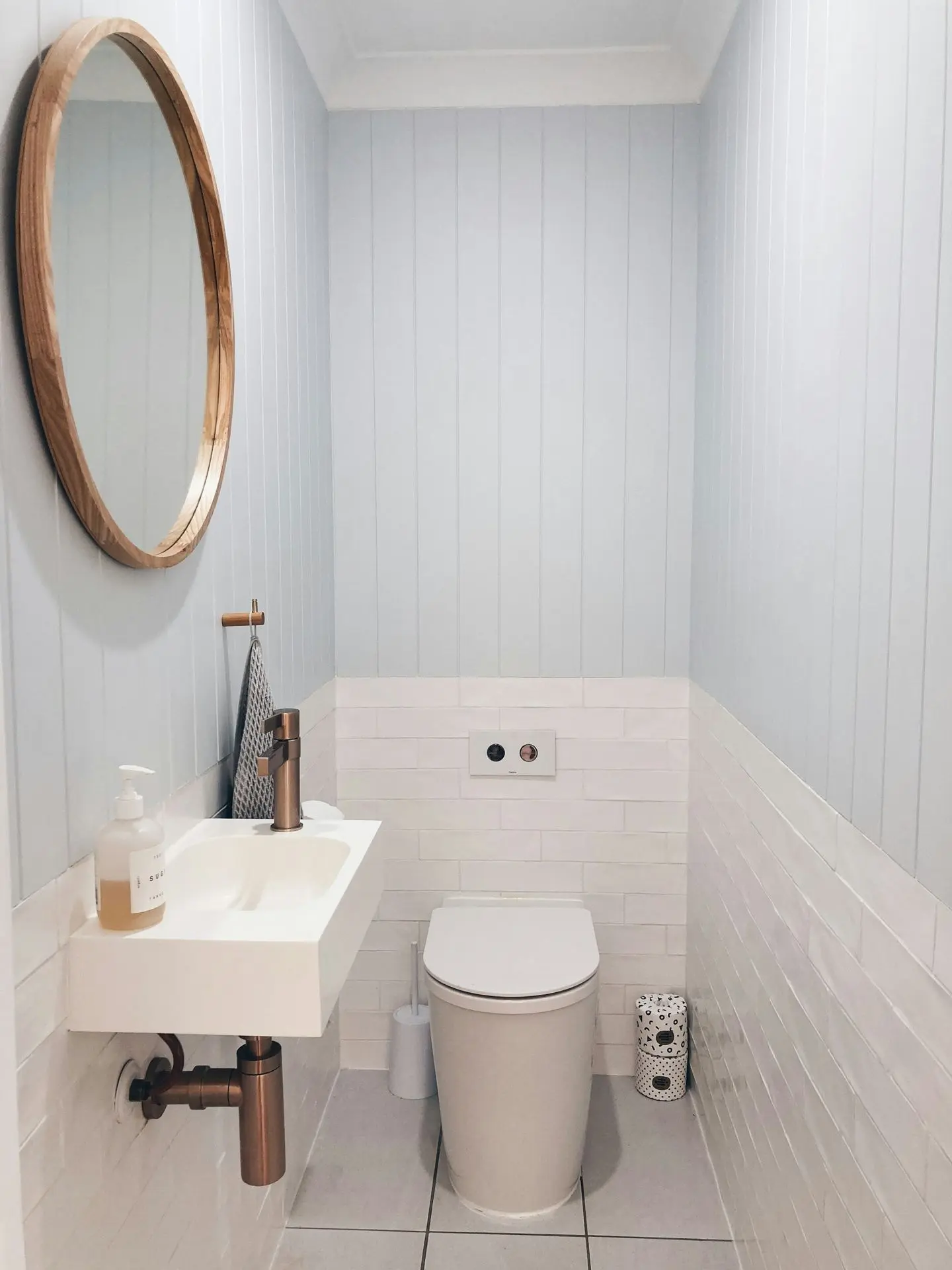 white ceramic sink with stainless steel faucet