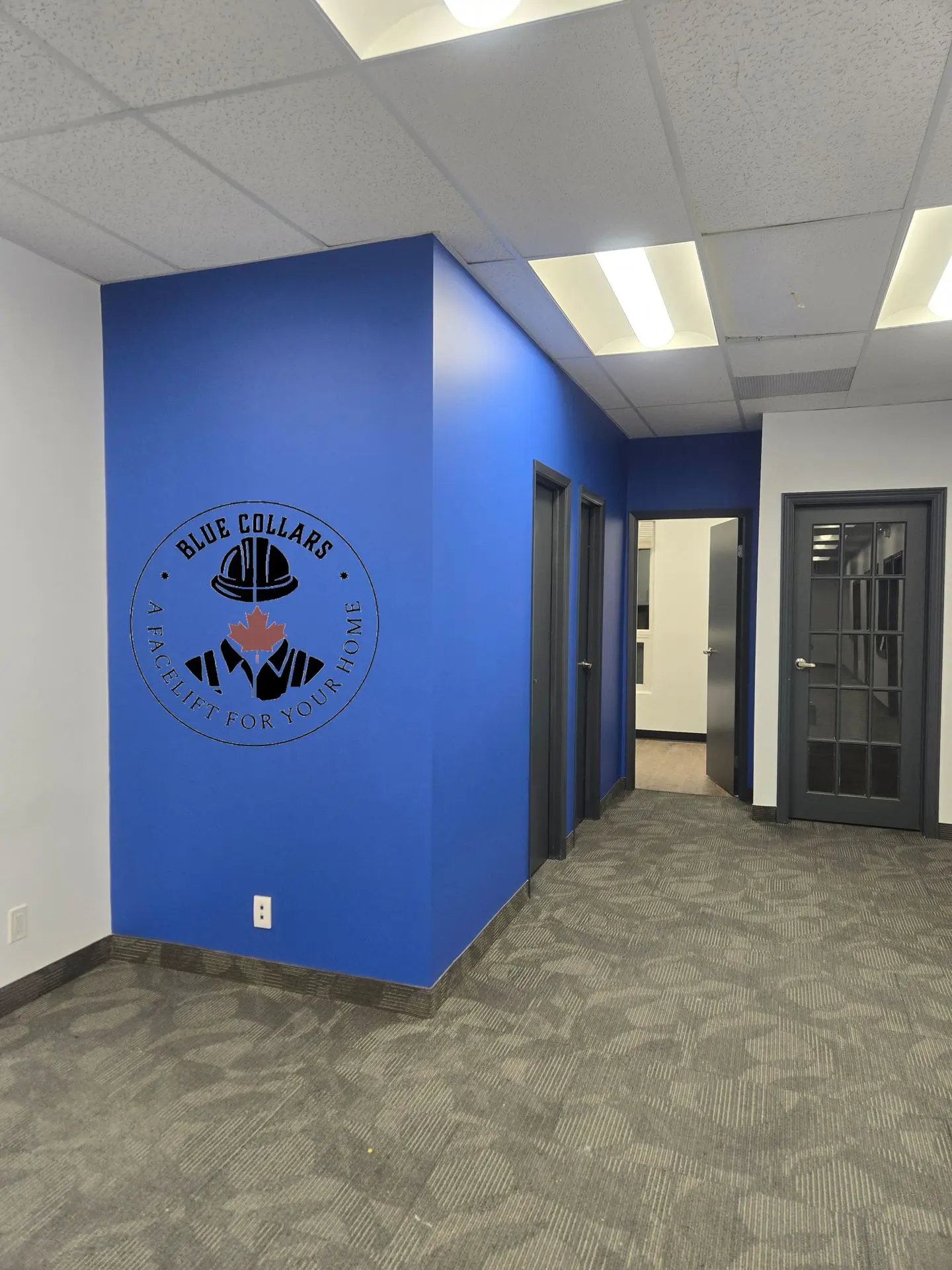 accent feature wall painting with geometric design in Toronto loft