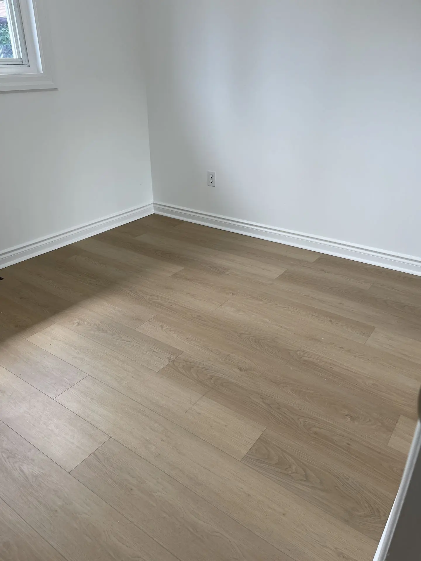 Natural wood color water proof LVP vinyl flooring installed in Toronto Gta